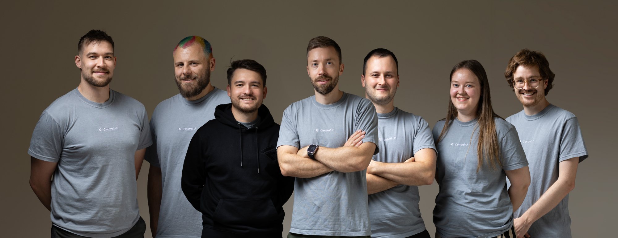 Das Team von Control-F, sieben Personen nebeneinander